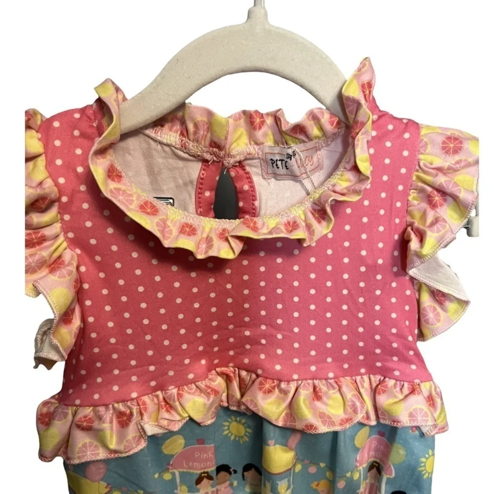 Pete & Lucy Pink Lemonade Stand Short Sleeve Ruffle Romper. NWT.